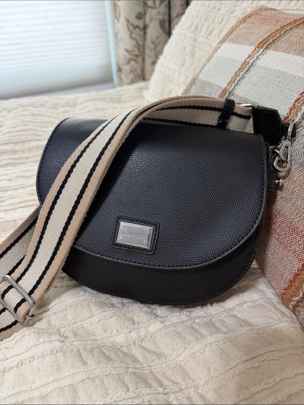 Calvin Klein Black Crossbody Saddle Bag with Cream-Striped Canvas Strap